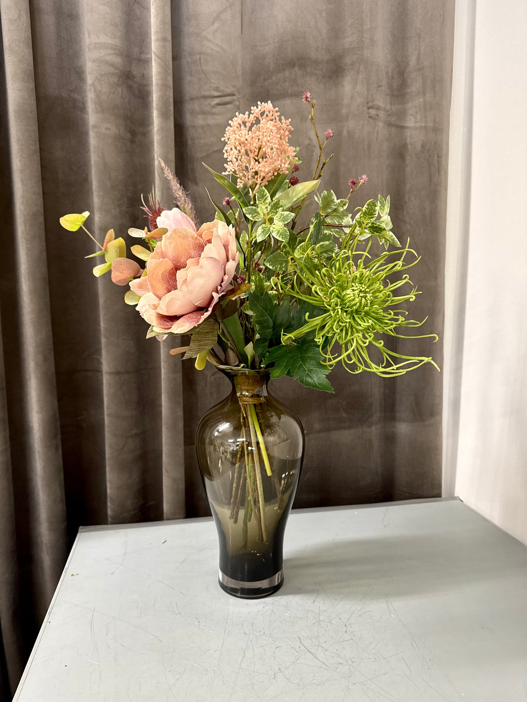 Buket af udgået blomster
